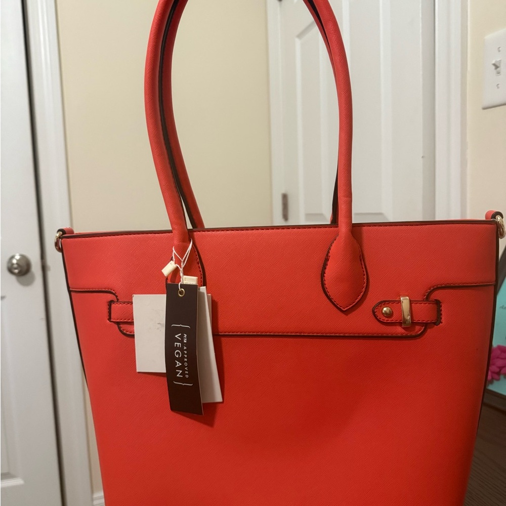 Isabelle Red tote bag with small zip up pouch.